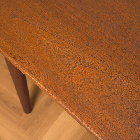 Danish dining table in teak and walnut