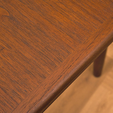 Danish dining table in teak and walnut