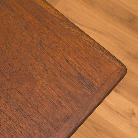 Danish dining table in teak and walnut