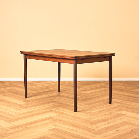 Danish dining table in teak and walnut