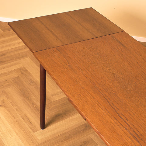 Danish dining table in teak and walnut