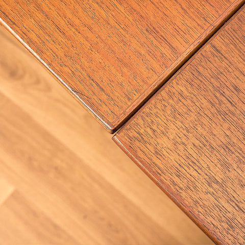 Danish dining table in teak and walnut