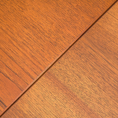 Danish dining table in teak and walnut