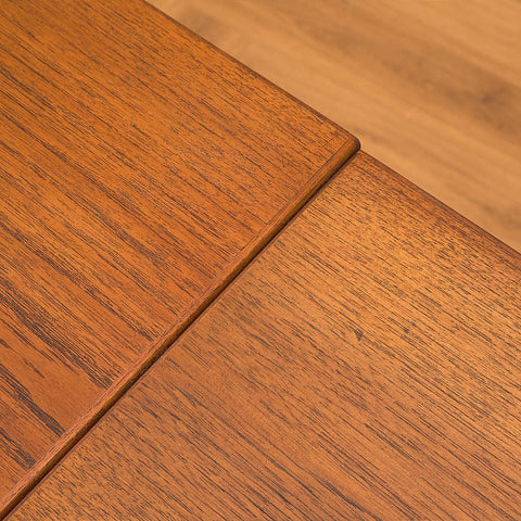 Danish dining table in teak and walnut