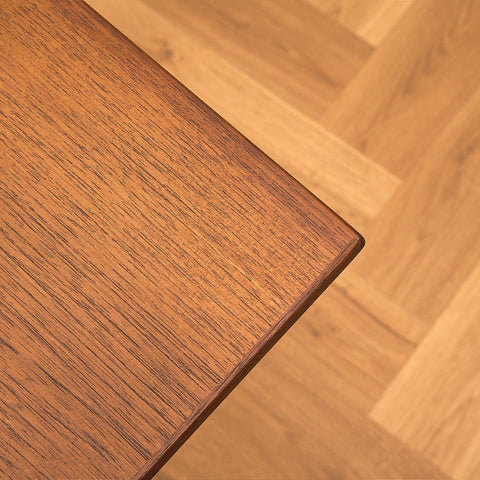 Danish dining table in teak and walnut
