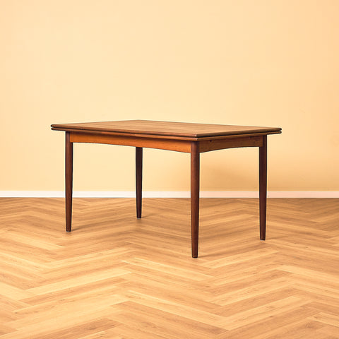 Danish dining table in teak and walnut