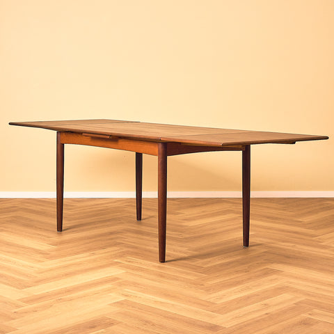 Danish dining table in teak and walnut