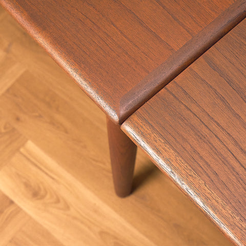 Danish dining table in teak and walnut