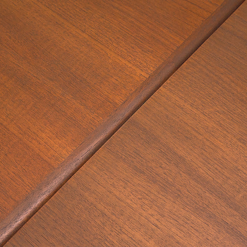 Danish dining table in teak and walnut