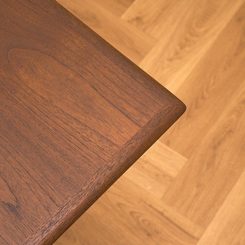 Danish dining table in teak and walnut