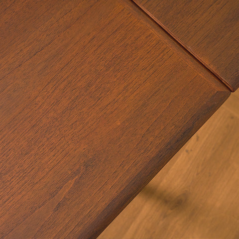 Danish dining table in teak and walnut