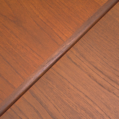 Danish dining table in teak and walnut