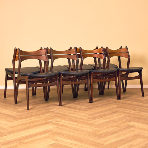 Danish dining chairs in walnut and teak by Erik Buch for Chr. Christensen Møbelfabrik, model 310