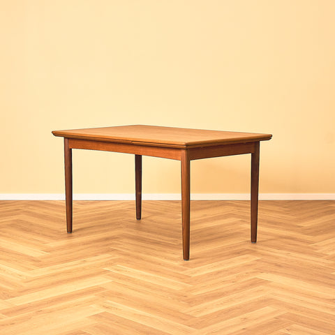 Danish dining table in teak and walnut