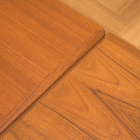 Danish dining table in teak and walnut