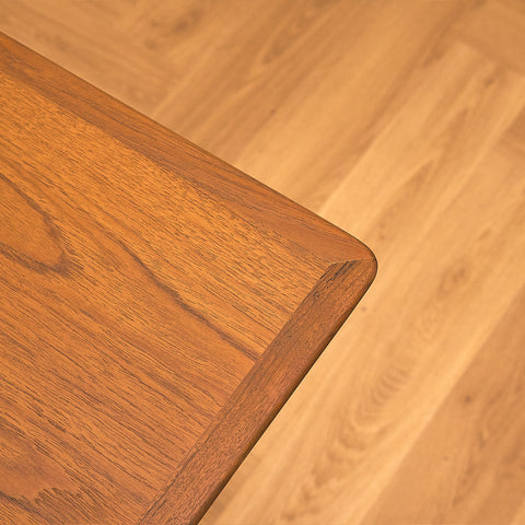 Danish dining table in teak and walnut