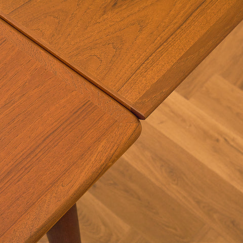 Danish dining table in teak and walnut
