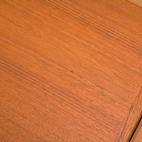 Danish dining table in teak and walnut