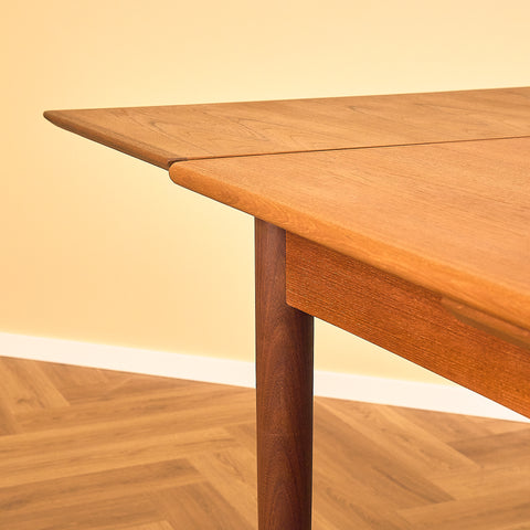 Danish dining table in teak and walnut