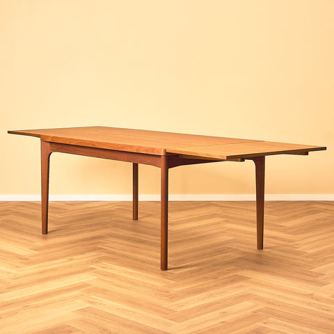 Danish dining table in teak by Henning Kjærnulf for Vejle