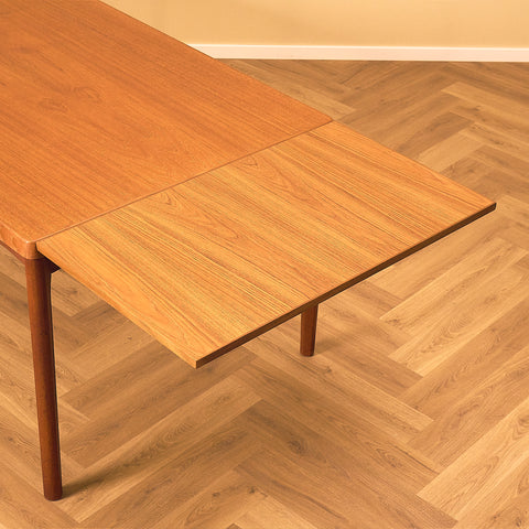 Danish dining table in teak by Henning Kjærnulf for Vejle