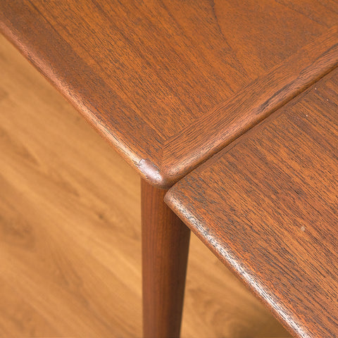 Danish dining table in teak and walnut
