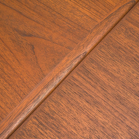 Danish dining table in teak and walnut