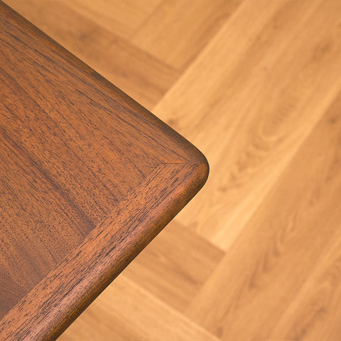 Danish dining table in teak and walnut