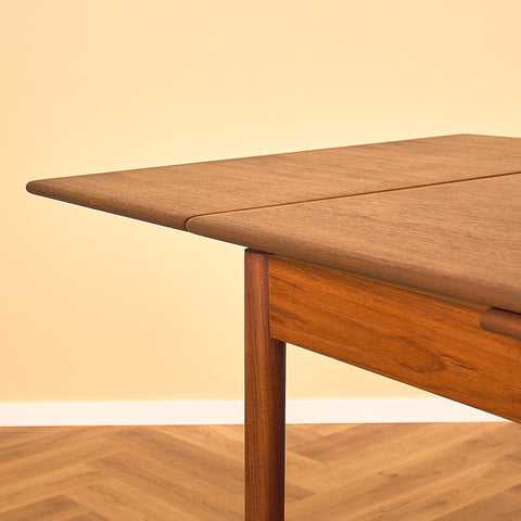 Danish dining table in teak and walnut