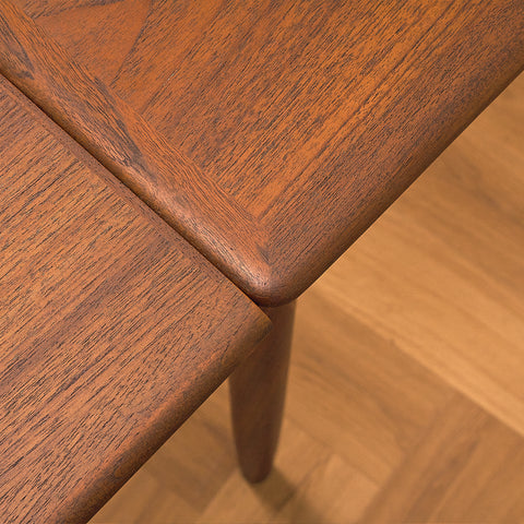 Danish dining table in teak and walnut