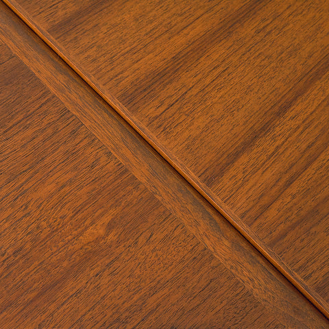 Danish dining table in teak and walnut