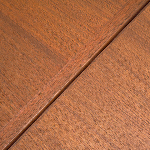 Danish dining table in teak and walnut
