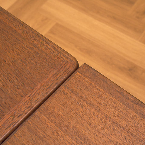 Danish dining table in teak and walnut