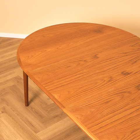 Danish round dining table in teak