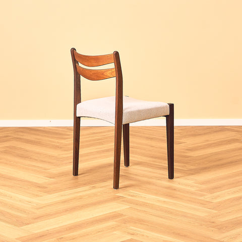 Danish dining chairs in teak and walnut