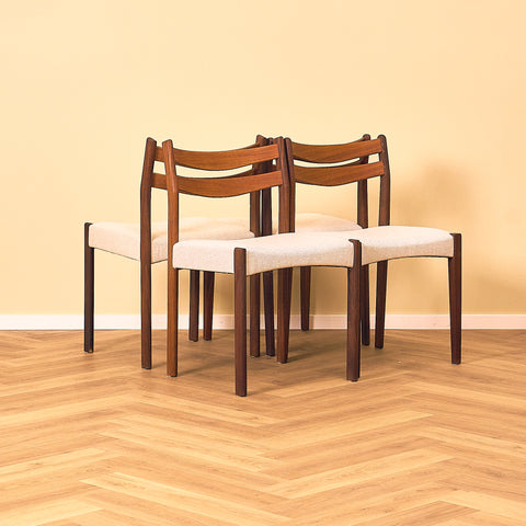 Danish dining chairs in teak and walnut