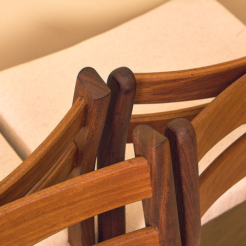 Danish dining chairs in teak and walnut