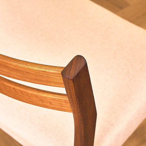 Danish dining chairs in teak and walnut