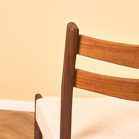 Danish dining chairs in teak and walnut