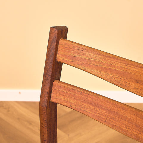 Danish dining chairs in teak and walnut