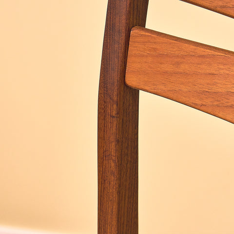 Danish dining chairs in teak and walnut