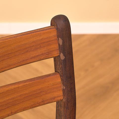 Danish dining chairs in teak and walnut