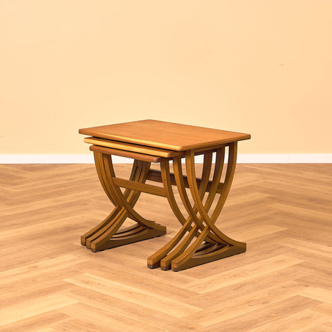 English set of nest of tables in teak and beech by Nathan