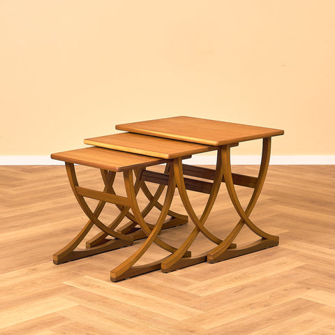 English set of nest of tables in teak and beech by Nathan
