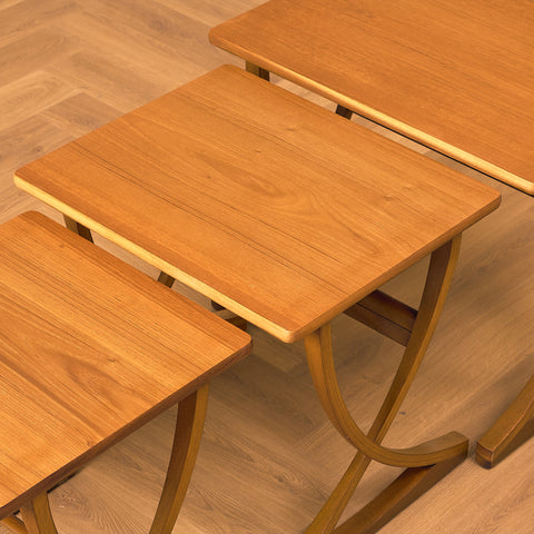 English set of nest of tables in teak and beech by Nathan