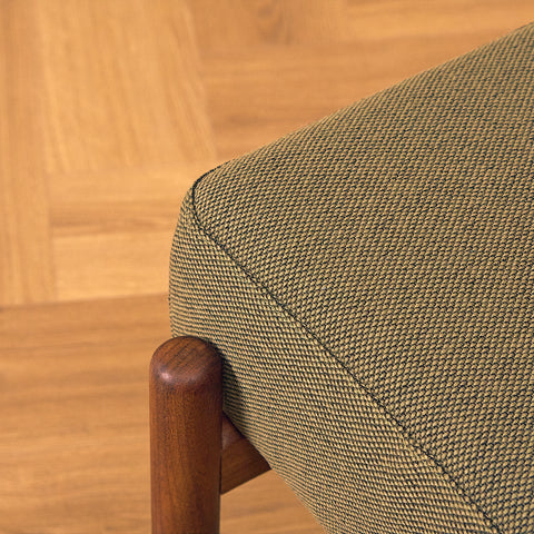 Danish armchair with stool in teak and walnut