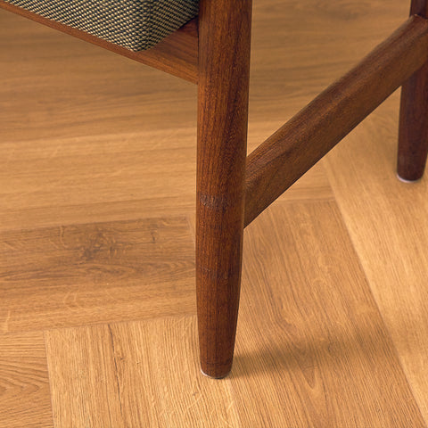 Danish armchair with stool in teak and walnut
