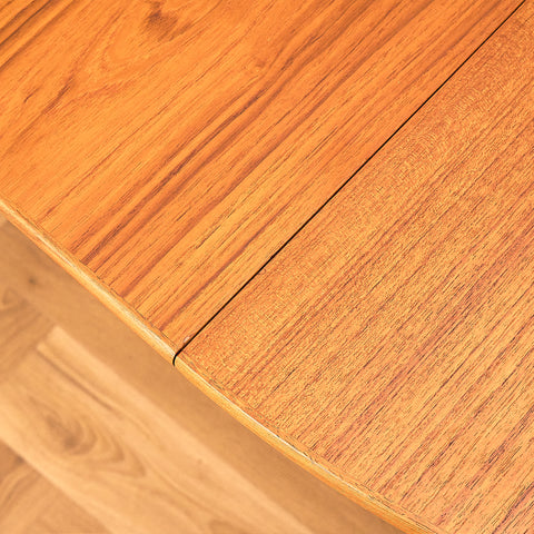 Danish round dining table in teak by Henry Rosengren Hansen