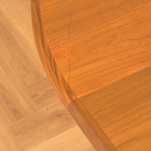 British round dining table in walnut and teak by G-Plan