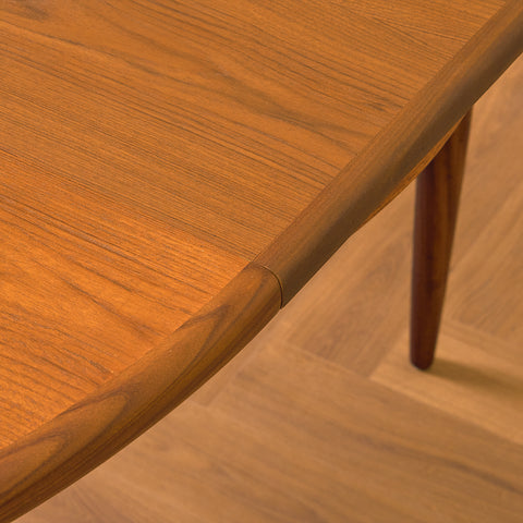 British round dining table in walnut and teak by G-Plan
